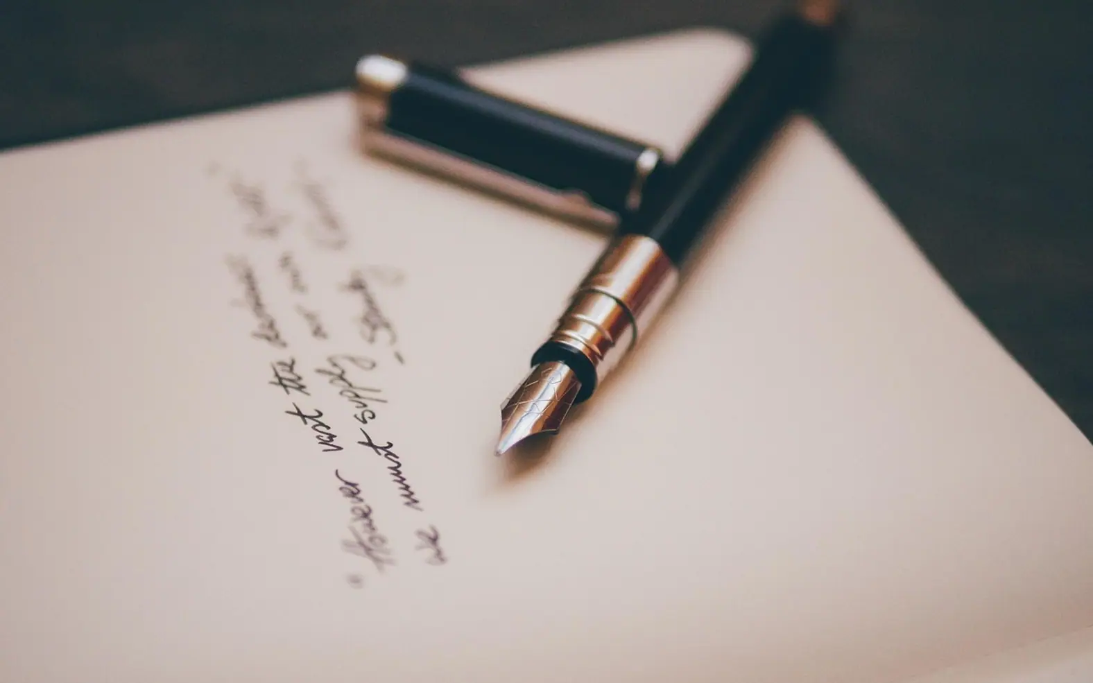 Fountain pen, notebook and paper